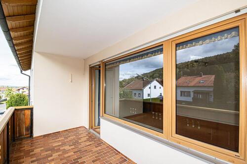 OG_Wohnzimmer_mit_Zugang_Balkon (3) - 