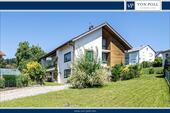 Aussenansicht - Freiraum und Vielfalt: Einfamilienhaus mit Einliegerwohnung und Garten