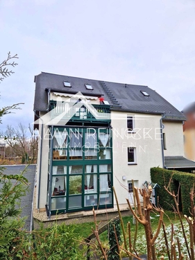 Hausansicht Rückseite mit Wintergarten - 