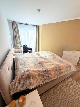 Schlafzimmer mit Balkonzugang - 