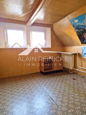 Zimmer im Dachgeschoß - 