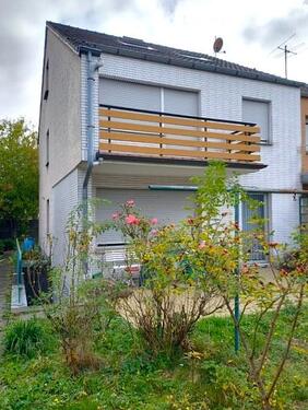 Gebäuderückseite - 6 Zimmer Reihenendhaus zum Kaufen in Köln