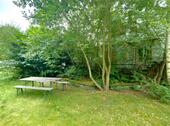 Gartenblick des noch ungeteilten Grundstücks zurück - 5 Zimmer Baugrundstück in Köln