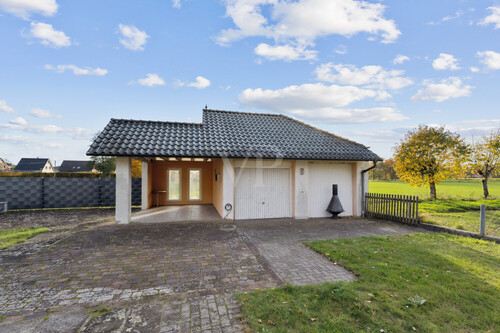 Garagen mit überdachtem Freisitz - Zweifamilienhaus mit 185,00 m² in Mettingen zum Kaufen
