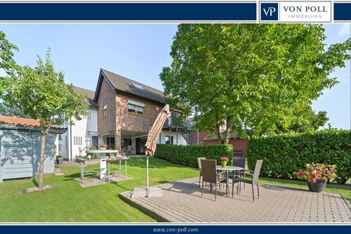 Titelbild - 4-Zimmer Wohnung in attraktiver Umgebung mit großzügigem Gartenanteil!