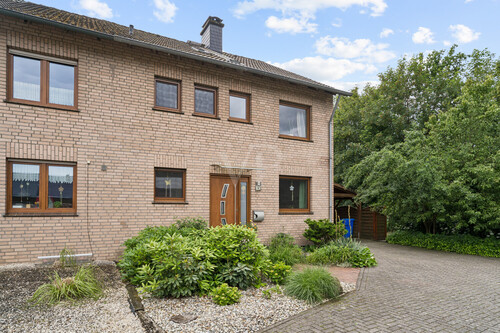 Außenansicht-Straßenseite - 6 Zimmer Doppelhaushälfte zum Kaufen in Ibbenbüren
