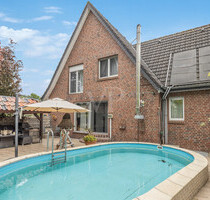 Familien Domicil trifft auf Top-Invest – Selbsttragendes Refugium mit Traumgarten mit Pool und Sauna - Hörstel