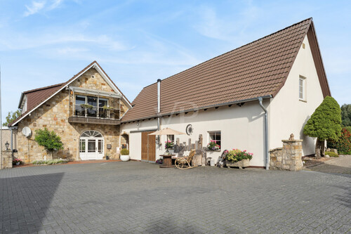 Rückansicht/ Eingangsbereich zur Wohneinheit I - Resthof mit 222,00 m² in Ibbenbüren zum Kaufen