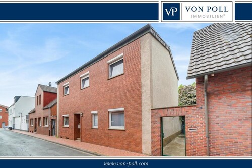 Titelbild - Gepflegtes Mehrfamilienhaus mit drei Wohneinheiten – Kapitalanlage oder Eigennutzung