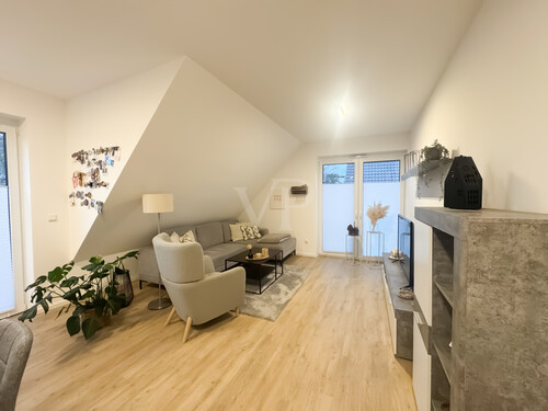 Wohnzimmer - Dachgeschoßwohnung mit 80,00 m² in Hopsten zur Miete