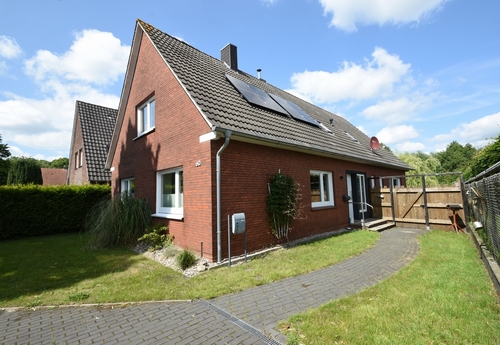 Seitenansicht - Attraktives Einfamilienhaus mit umfangreichen Modernisierungen!