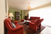 Wohnzimmer - 6 Zimmer Bungalow zum Kaufen in Papenburg