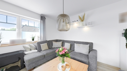 Wohnzimmer - 6 Zimmer Einfamilienhaus zum Kaufen in Krummhörn