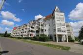 Frontale Hausansicht - Maisonettenwohnung mit 85,40 m² in Leipzig zum Kaufen