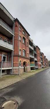 Rückansicht - Langfristig vermietete 2-Raum-Wohnung mit Balkon in gepflegter Wohnanlage