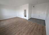 Wohnzimmer mit offener Küche (Referenzfoto) - 2-Zimmer-Wohnung mit Balkon - 375,00 EUR Kaltmiete, ca.  50,00 m² Wohnfläche