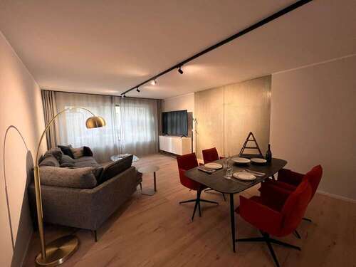 Wohn-Essbereich Musterwohnung - Fast wie ein Haus – 3-Zimmer-Maisonette mit Garten & Gäste-WC