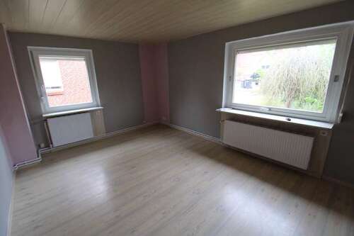 Wohnzimmer - Doppelhaushälfte mit 84,87 m² in Sankt Michaelisdonn zum Kaufen