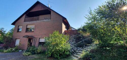 seitliche Ansicht - 8 Zimmer Mehrfamilienhaus, Wohnhaus in Gorleben