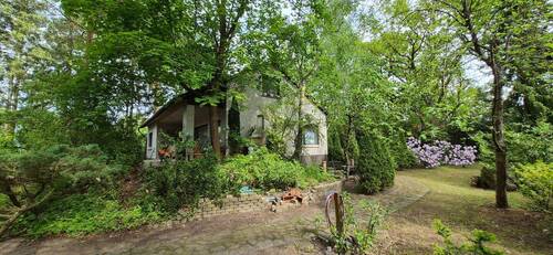Ansicht Haus + Garten - 