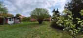 Rückansicht mit Gartenhaus und Haus - 