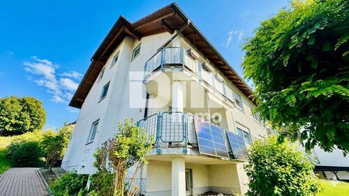 Seitenansicht Titel - (R)eserviert!Hochwertig sanierte, ebenerdige Dreizimmerwohnung mit Loggia + Stellplatz