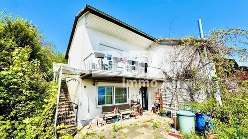 Titel Frontansicht - Umfangreich saniertes EFH inkl. PV-Anlage, Terrasse, Wintergarten und Garage