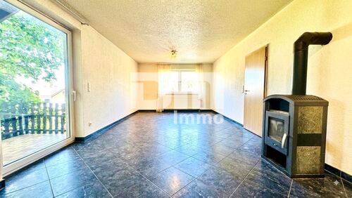 EG Wohn / Essbereich / Zugang Terrasse - Kamin - 