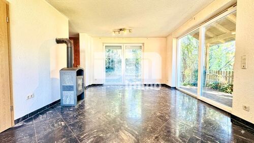 EG Wohn / Essbereich / Zugang Terrasse - Kamin - 