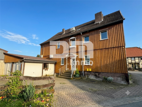 Rückansicht / Innenhof / Garage / Zugang Wohnen - 6 Zimmer Einfamilienhaus in Dassel
