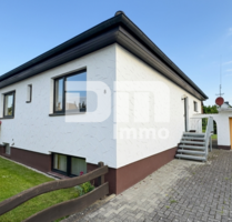 Solider Familien-Bungalow mit großem Potenzial in ruhiger Lage mit Wintergarten und Garage - Calden