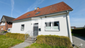 Frontansicht Titel - Charmantes Ein- bis Zweifamilienhaus mit großem Garten in begehrter Lage