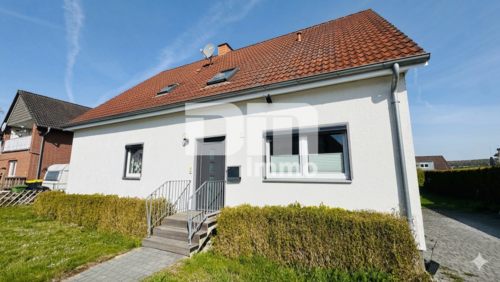Frontansicht Titel - Charmantes Ein- bis Zweifamilienhaus mit großem Garten in begehrter Lage