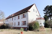 Haus Rückseite mit Giebel - Etagenwohnung mit 179,37 m&sup2; in Bitterfeld-Wolfen zum Kaufen