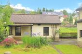 Garage mit Schuppen und Terrasse - 