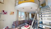 Wohnbereich mit Treppe zum OG - 