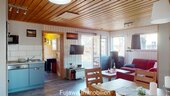 Wohnzimmer mit offener Küche - 