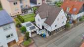 Südwest-Ansicht - Sonniges Einfamilienhaus mit Garten in Gladenbach OT