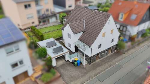 Südwest-Ansicht - Sonniges Einfamilienhaus mit Garten in Gladenbach OT