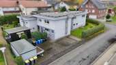 Ansicht von der Straße - Kapitalanlage: Mehrfamilienhaus mit 7 WE in Eschenburg OT mit Qualität