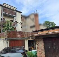 Mehrfamilienhaus mit Grundstück und Garagen , teilw. frei - Kahla