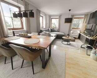 Gepflegte, vermietete 2-Zimmerwohnung mit Garten in Freilassing, Ortsteil Hofham - inkl. TG Platz.