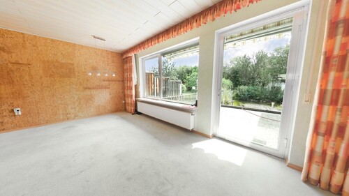 Wohnzimmer - Doppelhaushälfte mit 111,60 m&sup2; in Freilassing zum Kaufen
