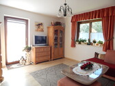 Wohnzimmer OG - 6 Zimmer Zweifamilienhaus in Oberteisendorf