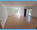 Wohnzimmer mit Zugang zum Balkon - 1 Zimmer Etagenwohnung zur Miete in Köthen OT Arensdorf
