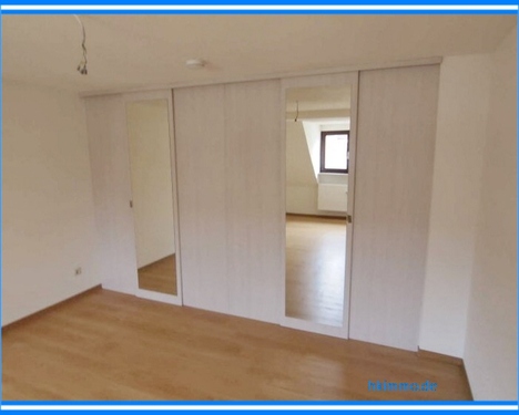 Schlafzimmer mit Einbauschrank - Etagenwohnung mit 60,00 m&sup2; in Köthen zur Miete