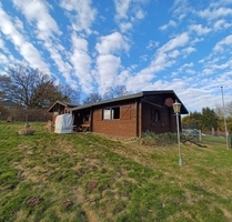 Zwei Blockhäuser auf großem Grundstück mit traumhaften Ausblick über Felder - Zarpen