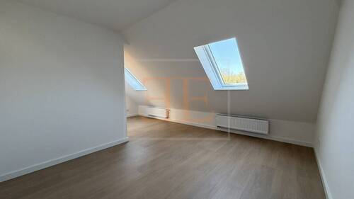 Schlafzimmer zwei im Dachgeschoss - 