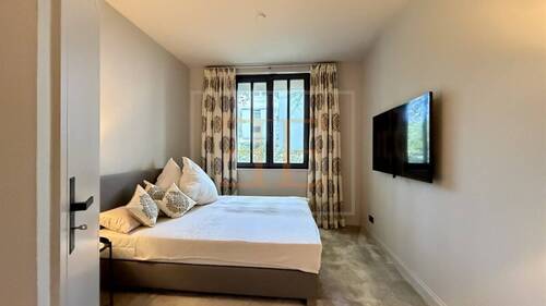 Schlafzimmer mit ruhigem Ausblick - 