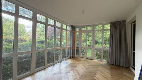 Wintergarten mit Gartenausblick - 